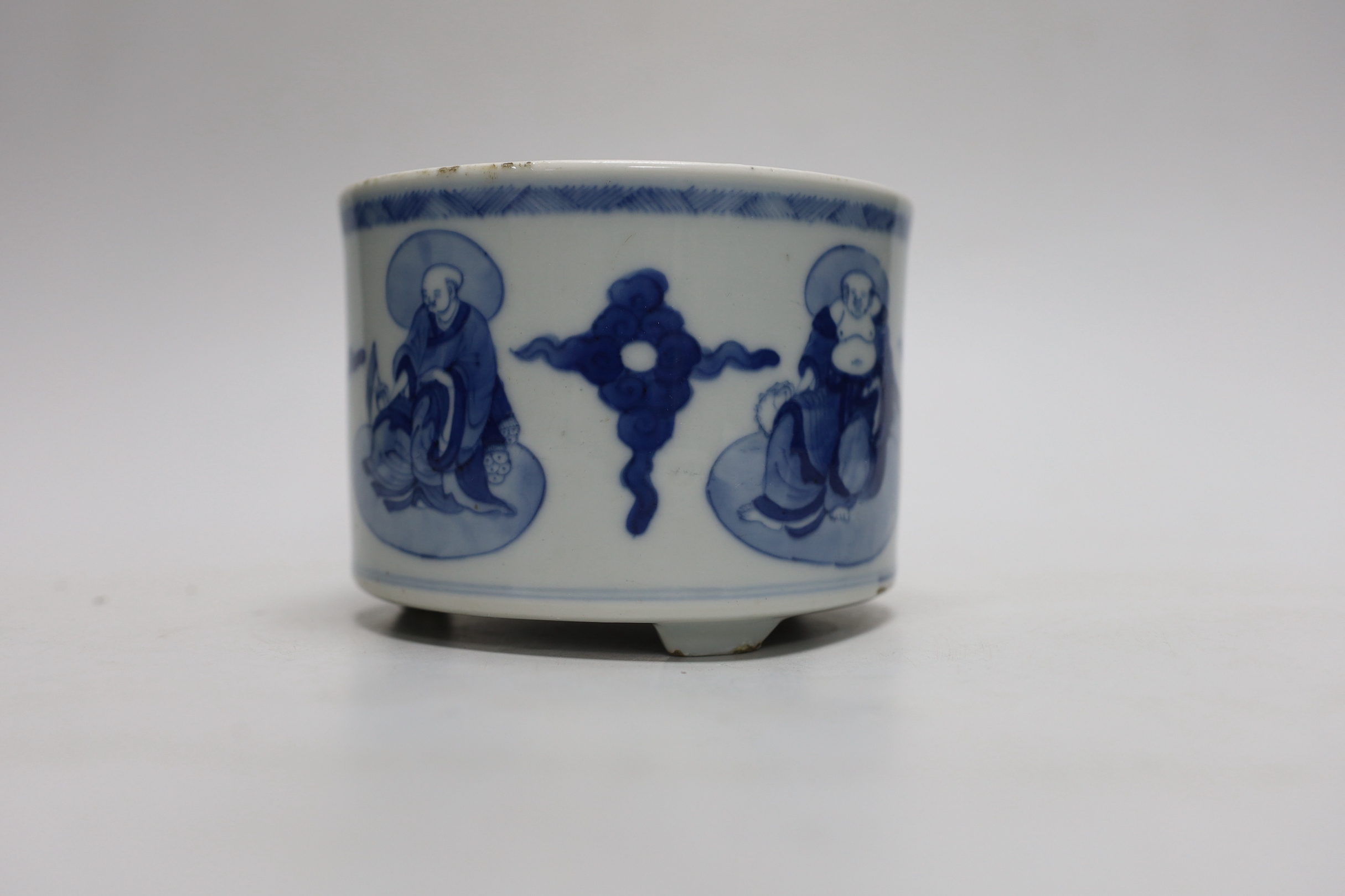 A Chinese blue and white ‘luohan’ brushpot, 13cm diameter